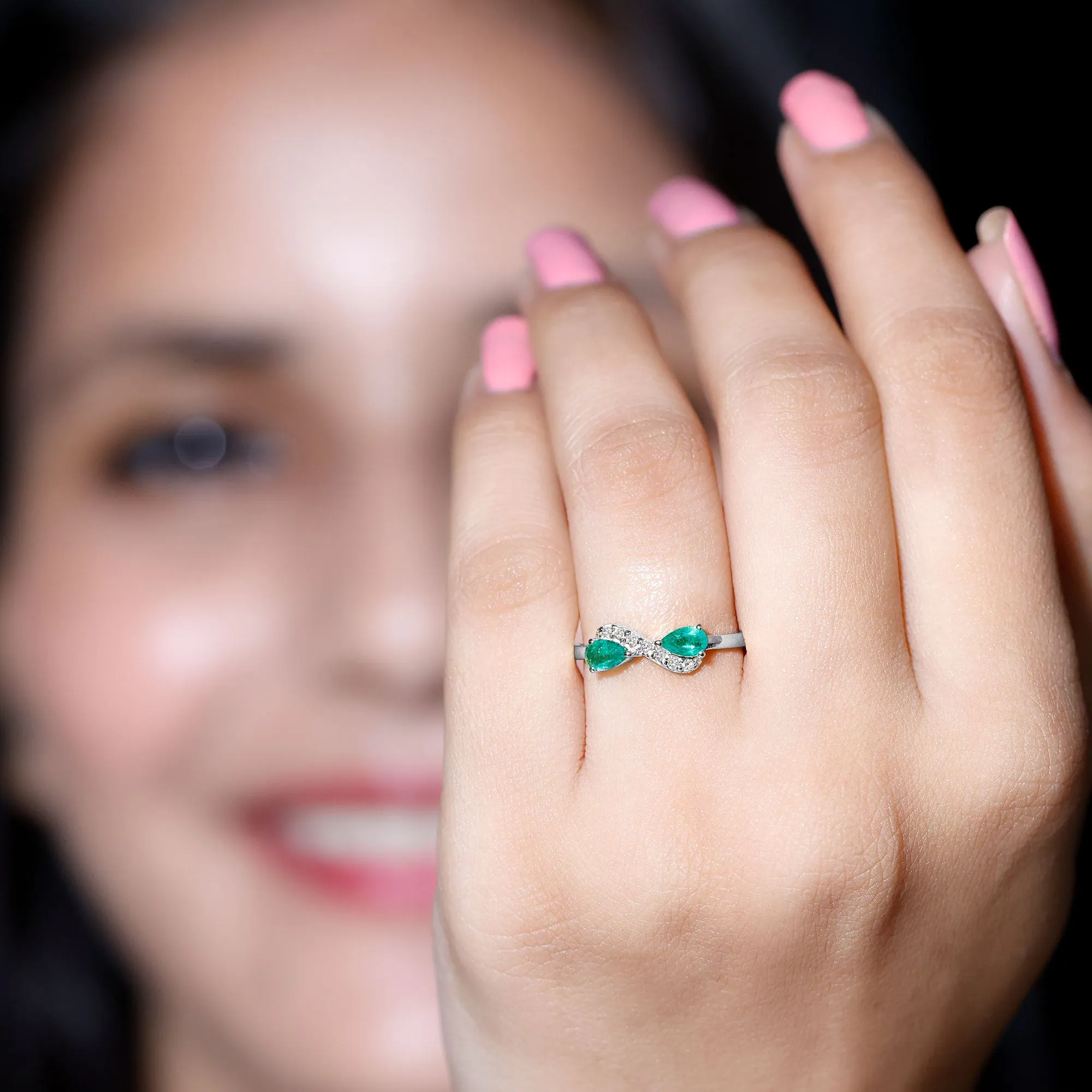 1/2 CT Pear Cut Emerald and Diamond Infinity Promise Ring