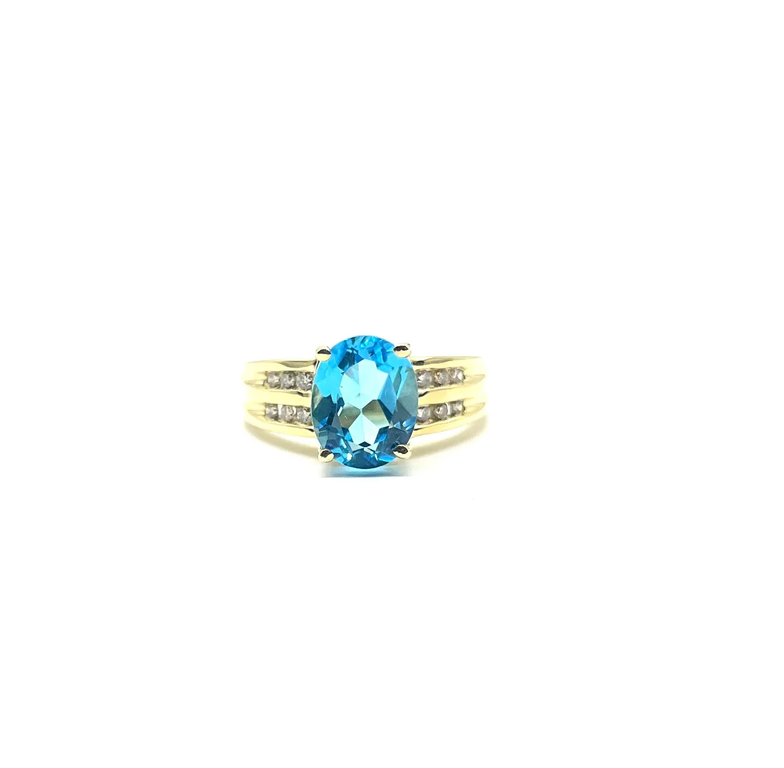 Blue Topaz Ring with Channel Set Diamonds