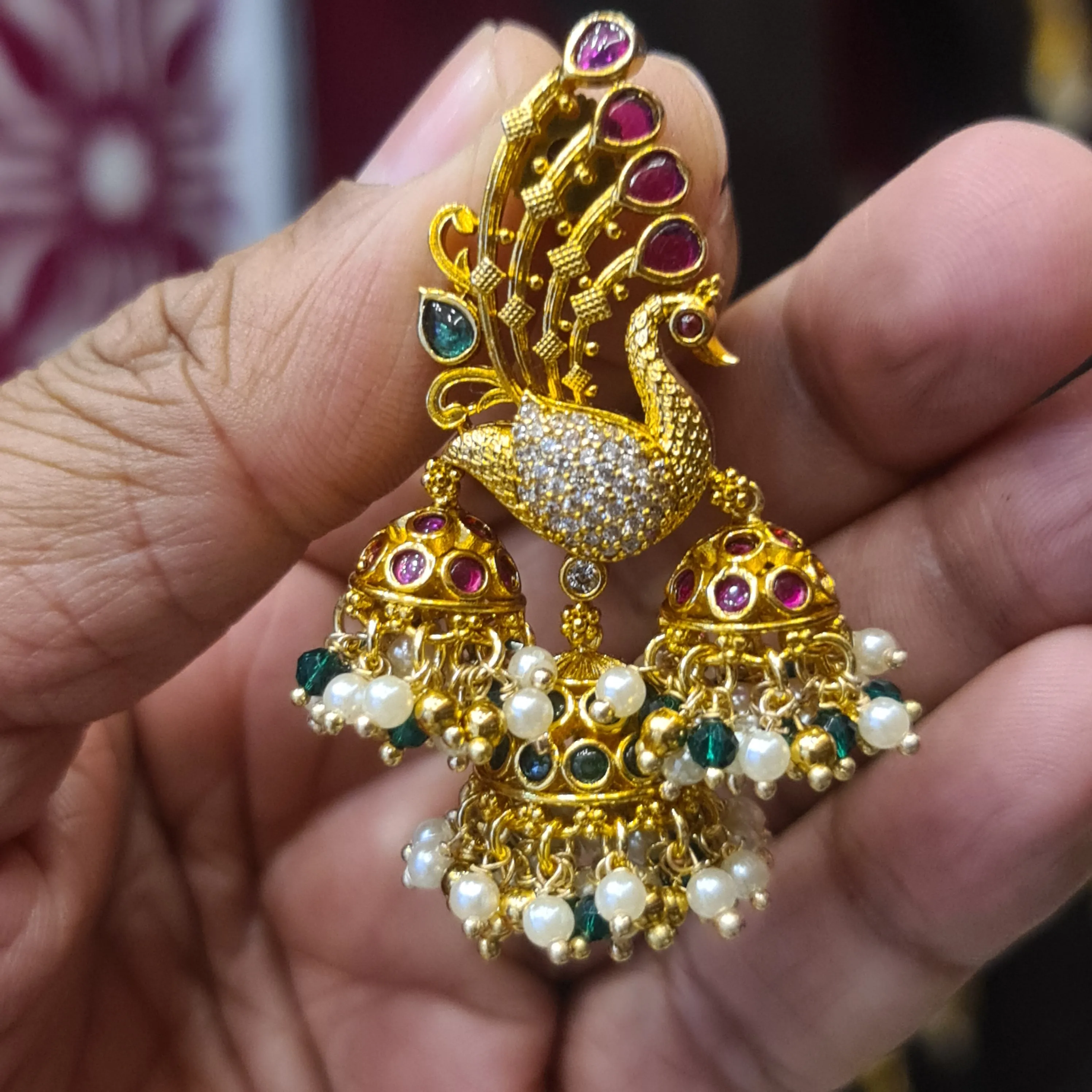 Exquisite Elegance: Unveiling the Alluring Antique Peacock Bahubali Jhumka Adorned with Pearls