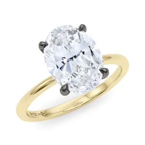 Mixed Metal Oval Cut Diamond Ring