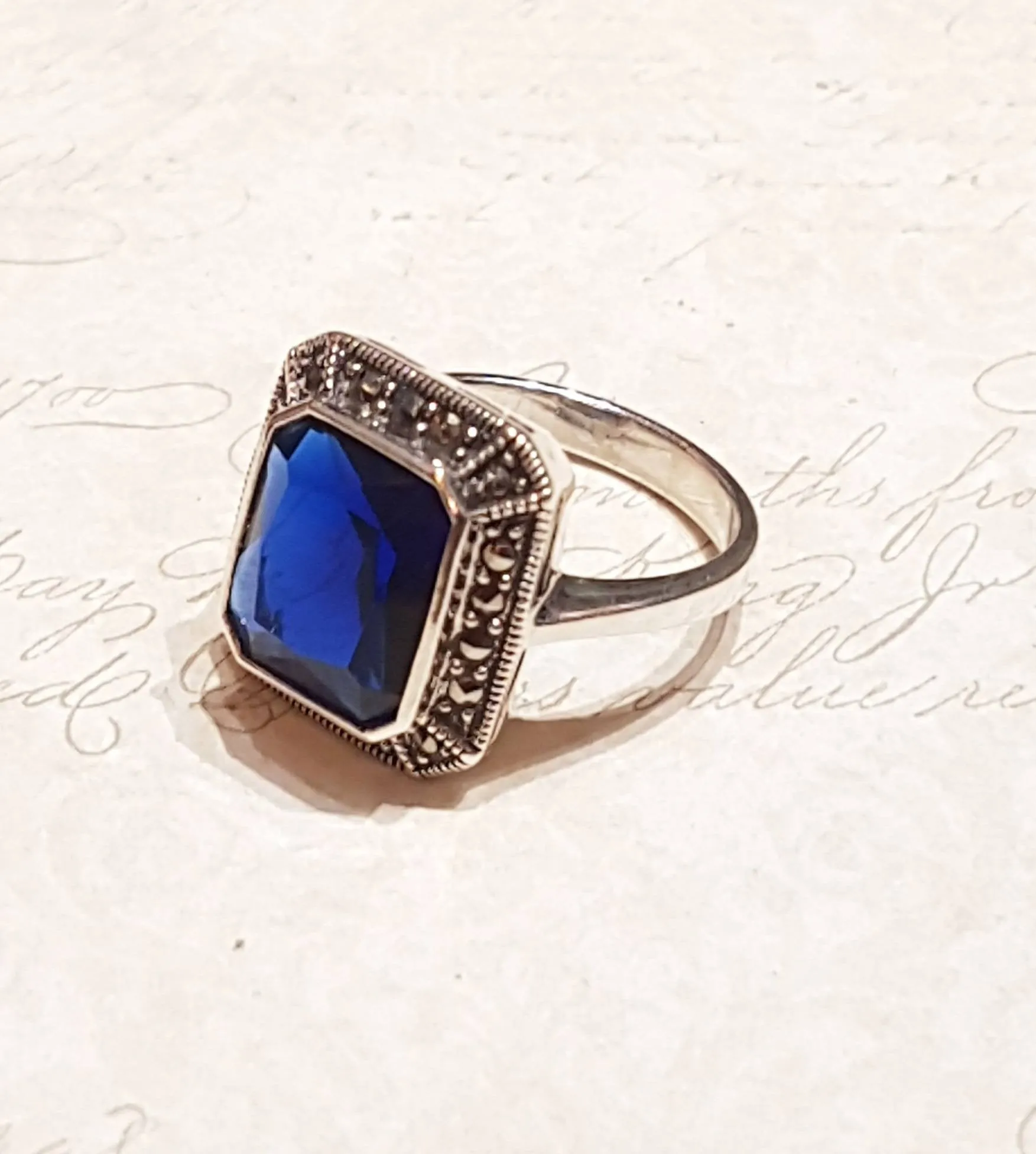 The Queen Solitaire Ring in Sapphire Blue Zircon